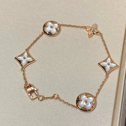 [Opulent Aurora]STAR AND SUN 5 MOTIF MOP PINK GOLD BRACELET