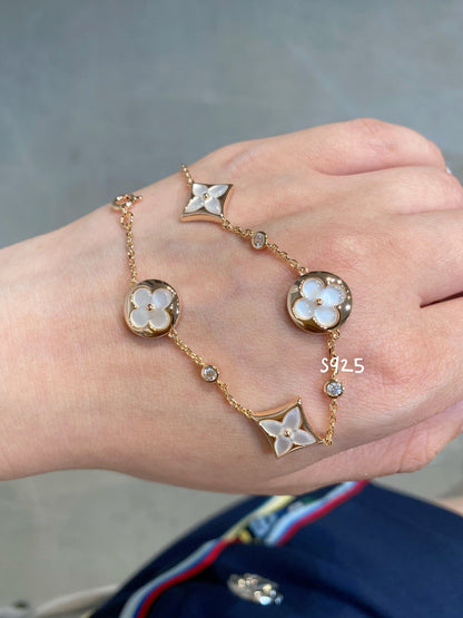 [Opulent Aurora]STAR AND SUN 4 MOTIF WHITE MOP PINK GOLD BRACELET